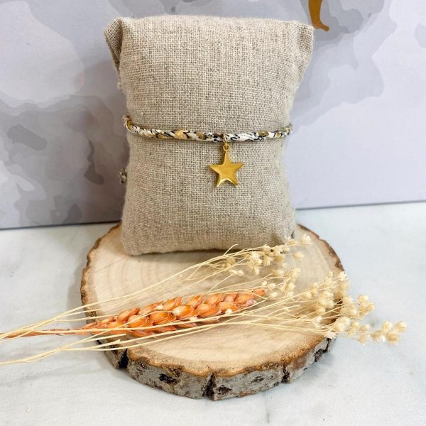 Boutique de bijoux à Toulouse : Bracelet réglable blanc avec une étoile en acier inoxydable doré suspendue