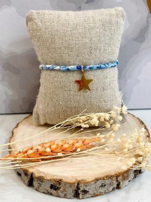 Boutique de bijoux à Toulouse : Bracelet réglable bleu avec une étoile en acier inoxydable doré suspendue