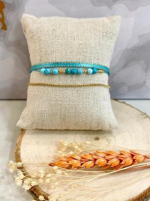 Boutique de bijoux à Toulouse : bracelet multi rangs en acier inoxydable doré avec du tissu et des perles turquoise