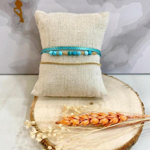 Boutique de bijoux à Toulouse : bracelet multi rangs en acier inoxydable doré avec du tissu et des perles turquoise