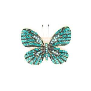 broche en forme de papillon de couleur vert