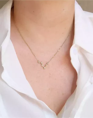 collier astro poisson dore en acier inoxydable