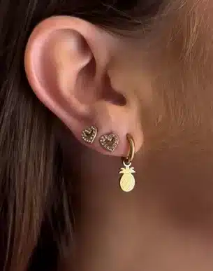 creoles pina acier inoxydable dore sur mannequin boutique bijoux toulouse