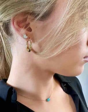 créole cabale en acier inoxydable doré sur mannequin boutique bijoux toulouse