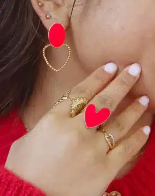 Boucles Valentino en acier inoxydable dore et emaille rougemannequin bijoux boutique toulouse